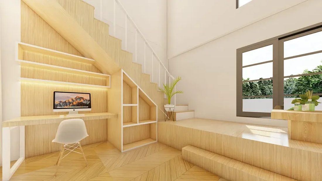 ภาพ 3D Perspective ภายในบ้าน มุมใต้บันไดไม้ พร้อมชั้นวางของและมุมนั่งเล่น